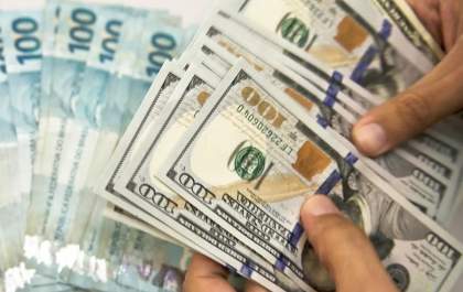 Dólar fecha a R$ 5,19 e bolsa bate recorde histórico